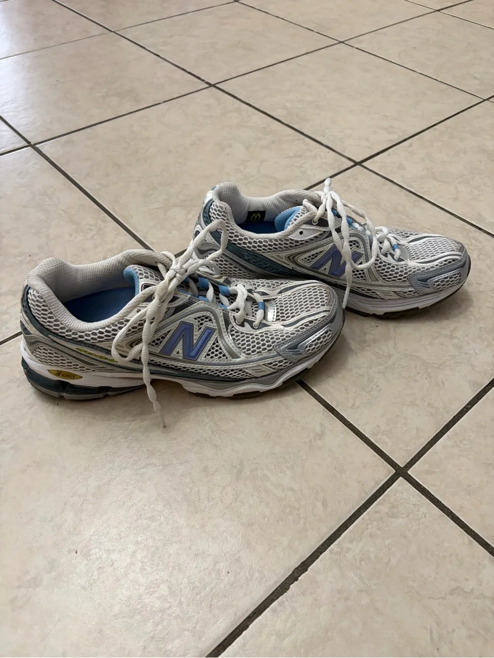 New Balance White and Light Blue Athletic Sneakers